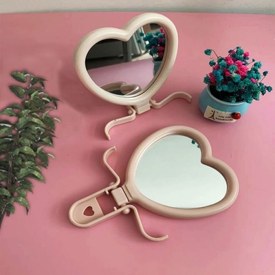 Lady Dressing Heart Shaped Pocket Adjustable Makeup Compact Mini Mirror with Qualit