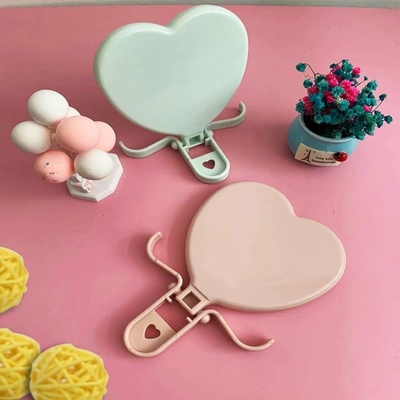 Lady Dressing Heart Shaped Pocket Adjustable Makeup Compact Mini Mirror with Qualit